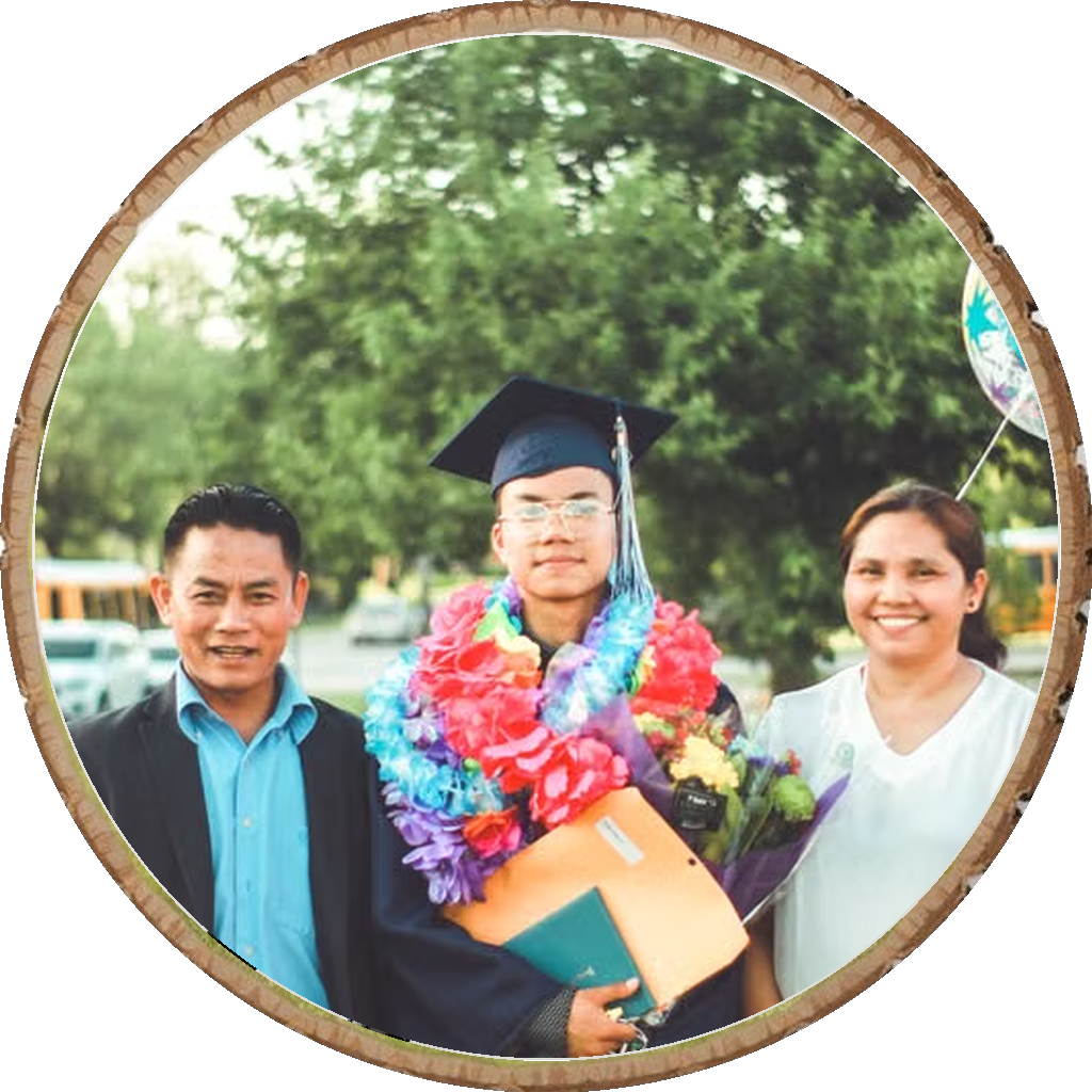 Present for a graduate family photo on wood slice